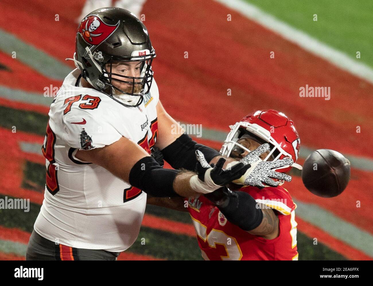 Tampa. 8th Feb, 2021. Joe Haeg (L) of Tampa Bay Buccaneers vies with Anthony Hitchens of Kansas City Chiefs during the NFL Super Bowl LV football game in Tampa, Florida, the United States, Feb. 7, 2021. Credit: Xinhua/Alamy Live News Stock Photo