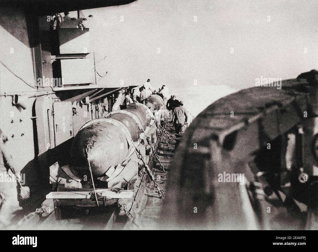 The launching of Japanese “Kaiten” man-controlled torpedoes from the light cruiser “Kitakami”. Stock Photo