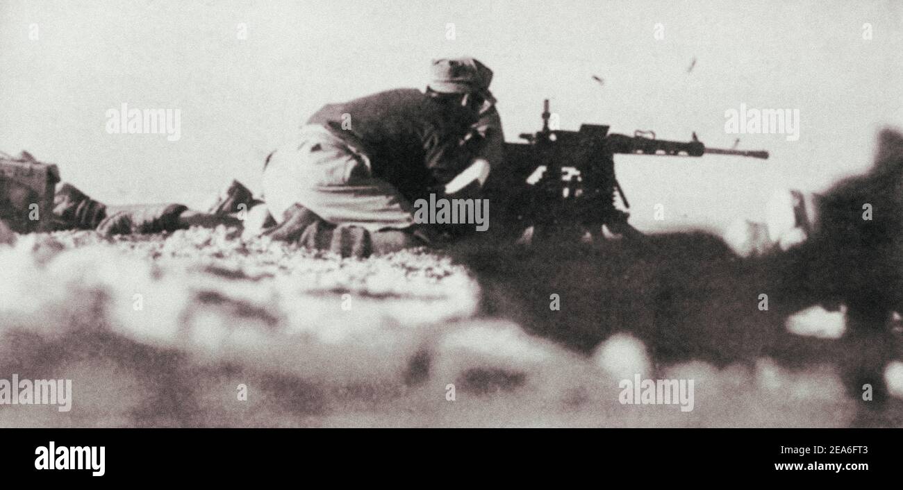 The Italian Army machine-gunners are firing at the enemy from the 8-mm FIAT-Revelli M1914/35 machine gun in the Battle of Cyrenaica (Libya). Libya, No Stock Photo