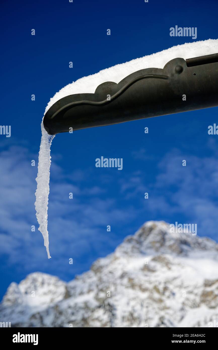icicle on a raingutter Stock Photo
