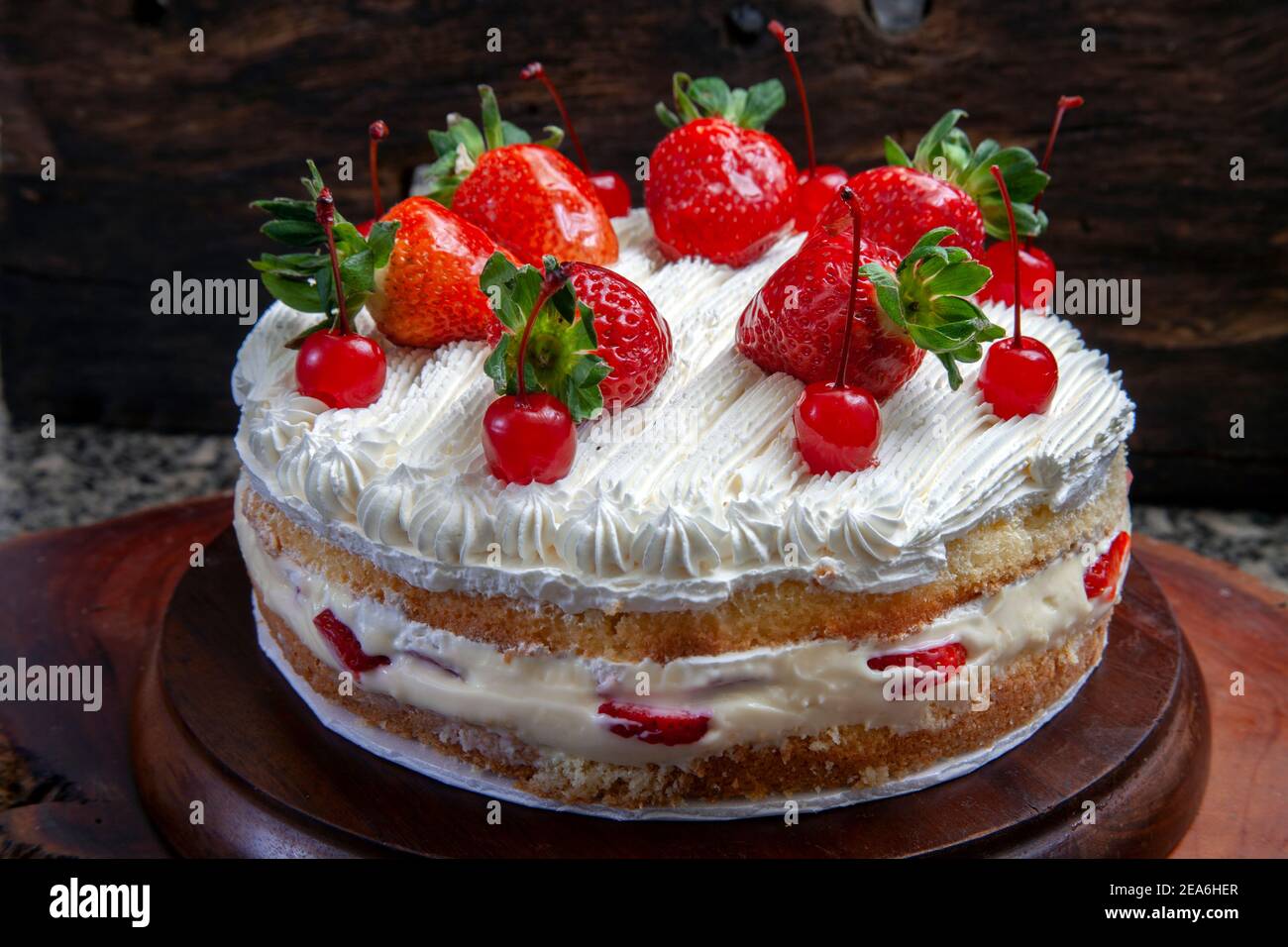 Chocolate, strawberry and whipped cream cake Stock Photo Alamy