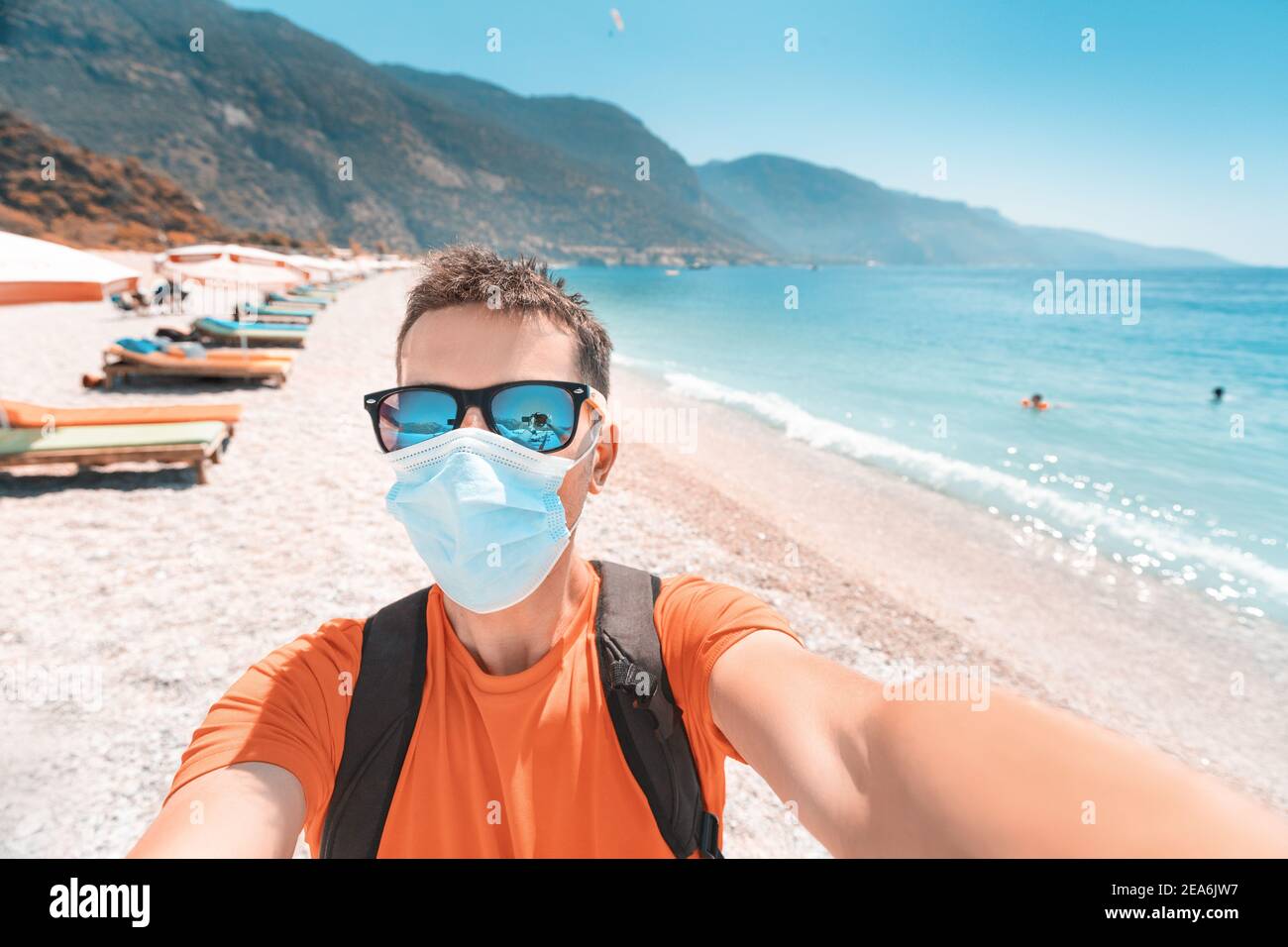 Tourist wearing mask walks hi-res stock photography and images - Alamy