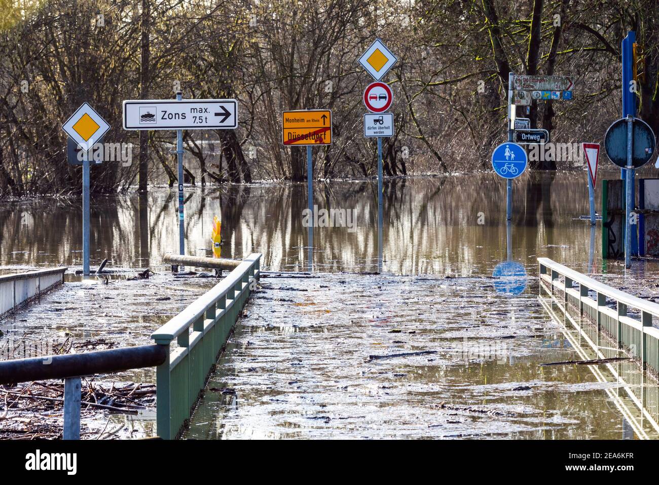 Flood of the Rhine in the south of Dusseldorf, here a flooded country road Stock Photo