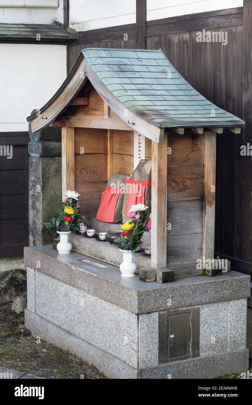 Nakanoshinyacho Jizo, a small Buddhist shrine with three stone Jizo at ...