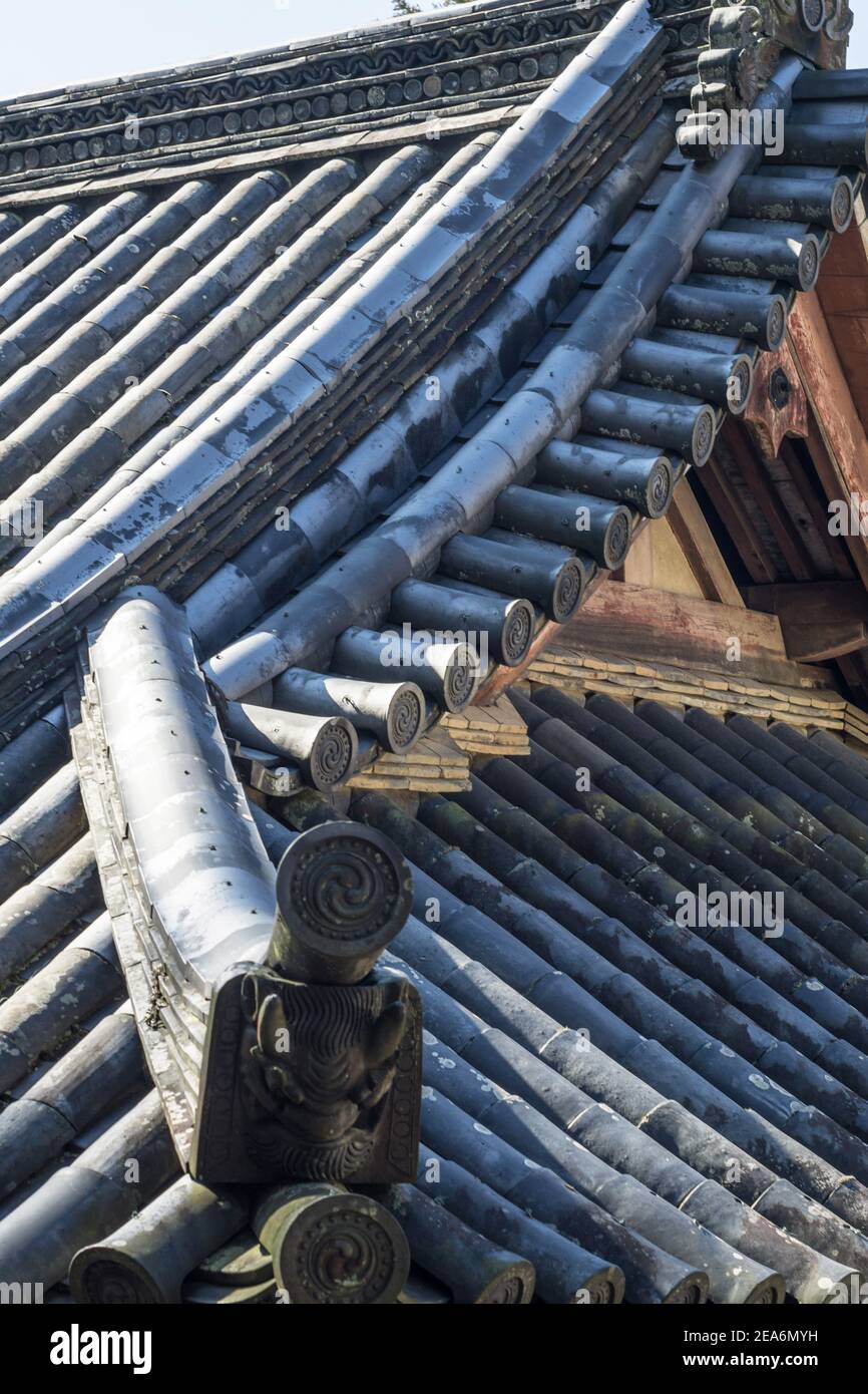 Close up detail of the ceramic roof tiles on Tamukeyama Hachimangu