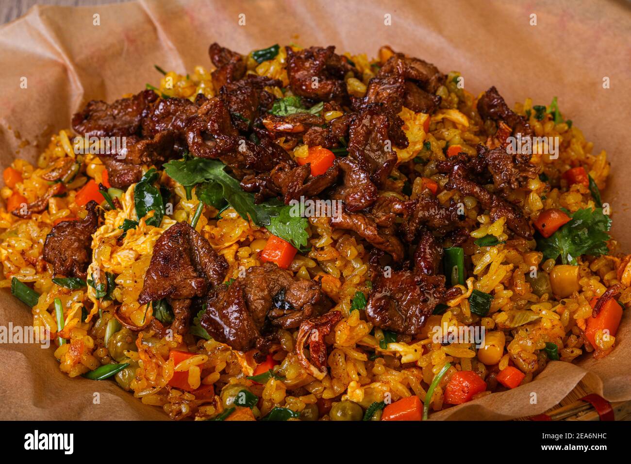 Asian cuisine - Fried Rice with beef and vegetables Stock Photo - Alamy