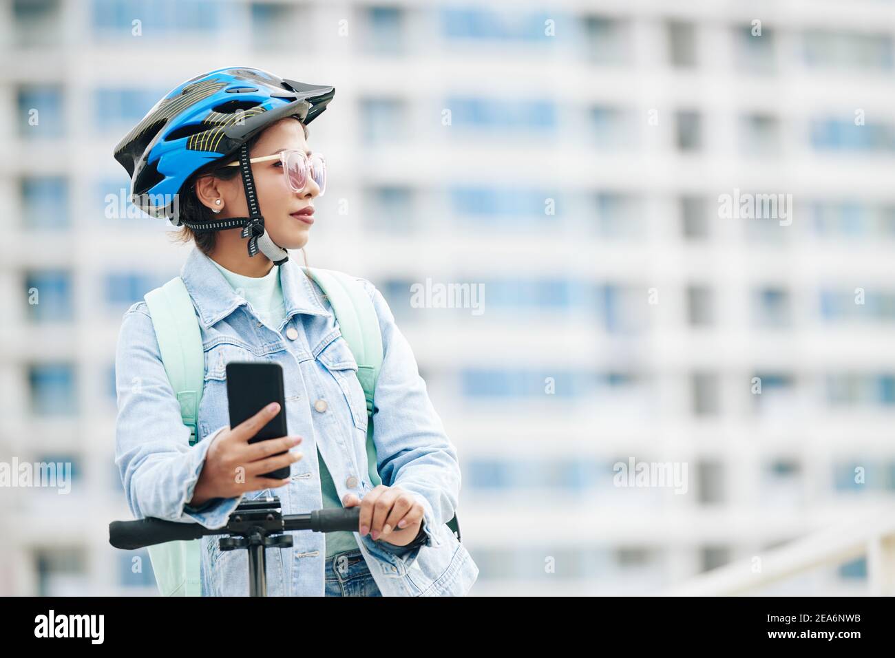 Woman in protective helmet Stock Photo