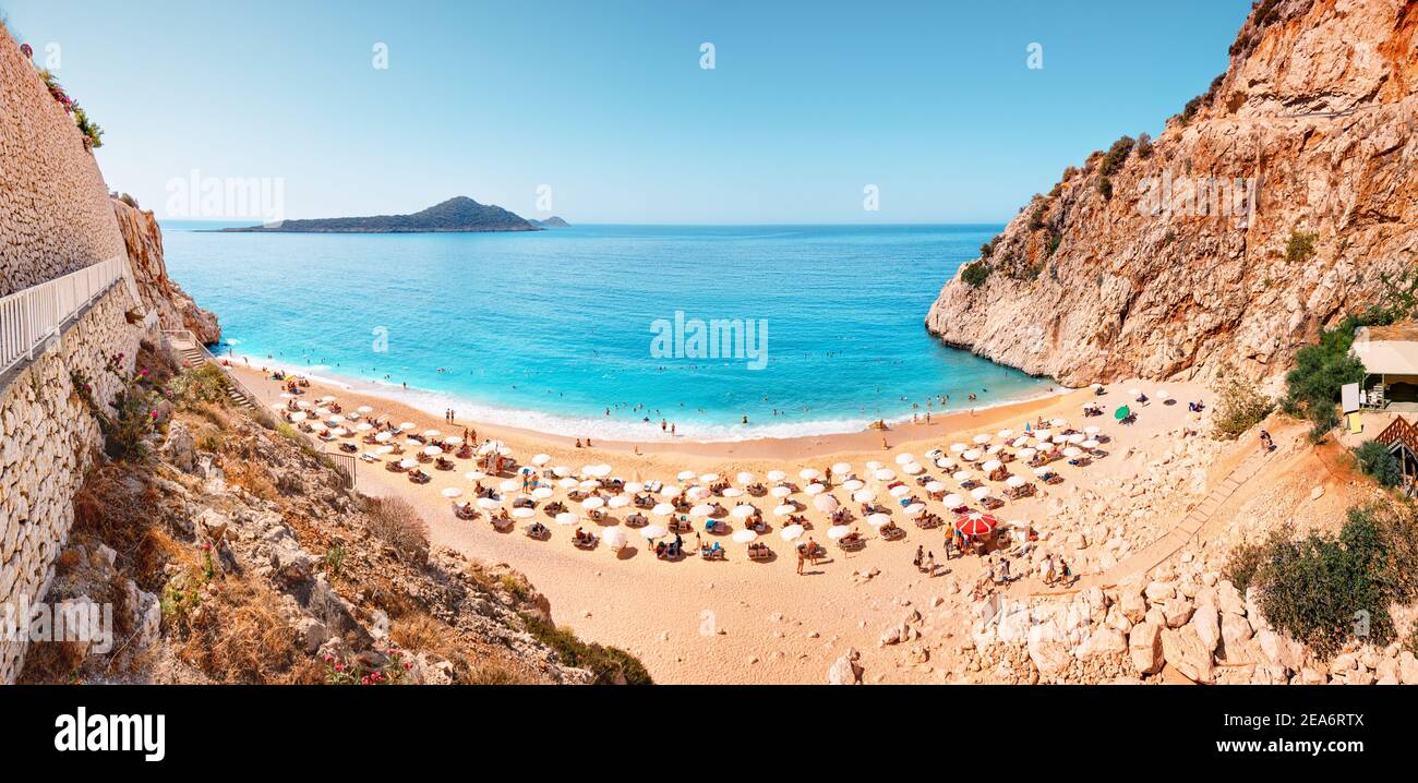 Panoramic view of sea and sun loungers in the narrow gorge. Very famous and popular among tourists and vacationers Kaputas beach on the Mediterranean Stock Photo
