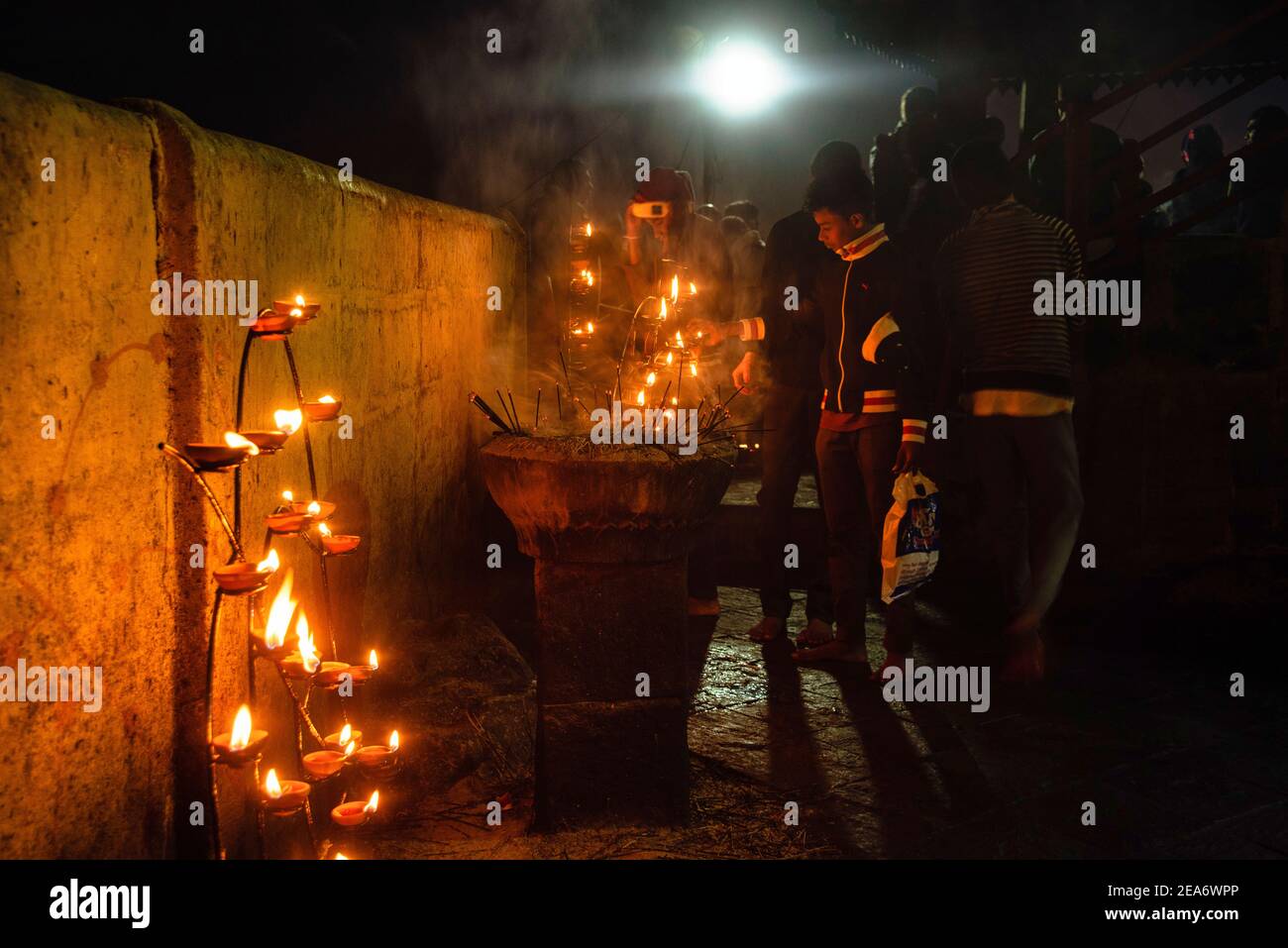 Cingalese people lighting candles Night time of Adam's peak Sri Lanka