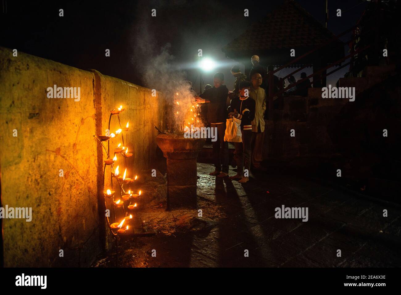 Cingalese people lighting candles Night time of Adam's peak Sri Lanka