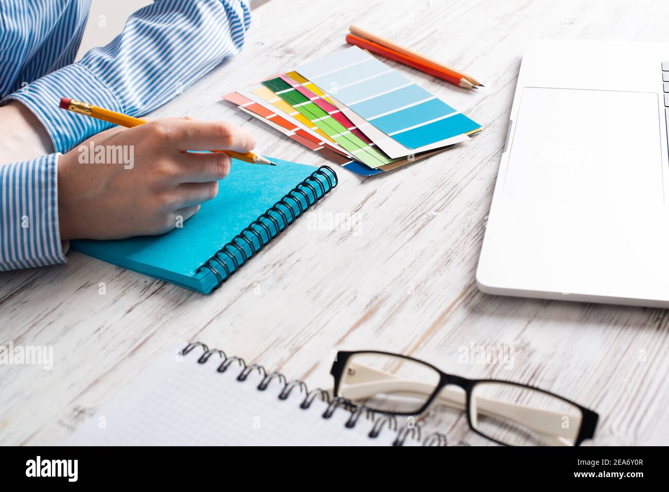 Top view creative designer working at desk Stock Photo - Alamy