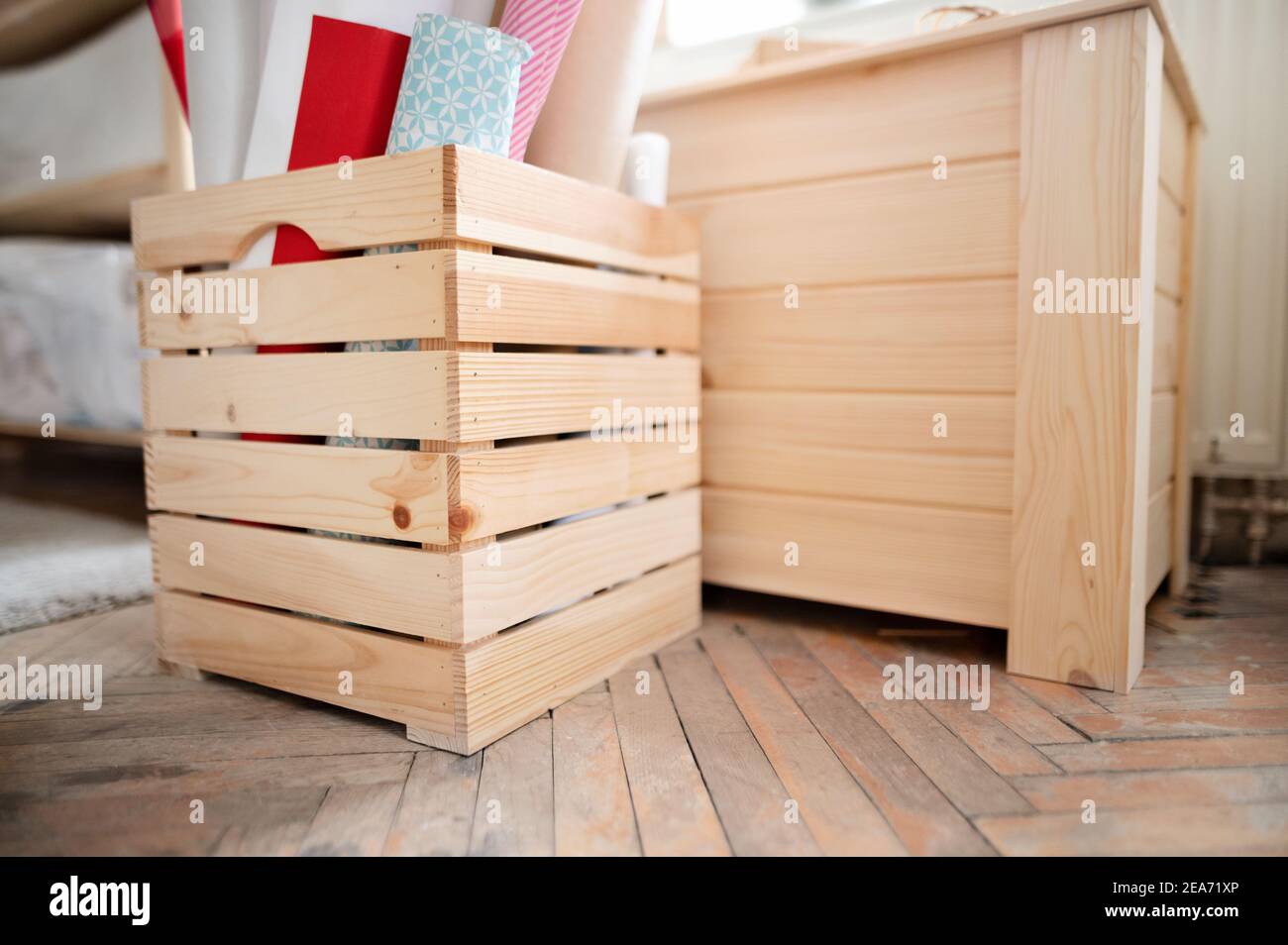 Wooden furniture boxes indoors in office, natural decor concept Stock