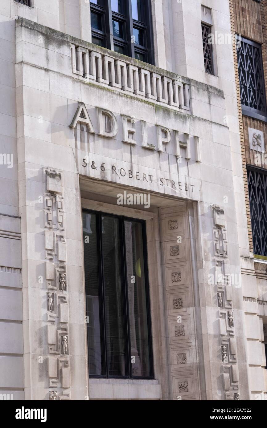 A sign showing one of the entrances to The Adelphi Building, an iconic art deco building in London. Stock Photo
