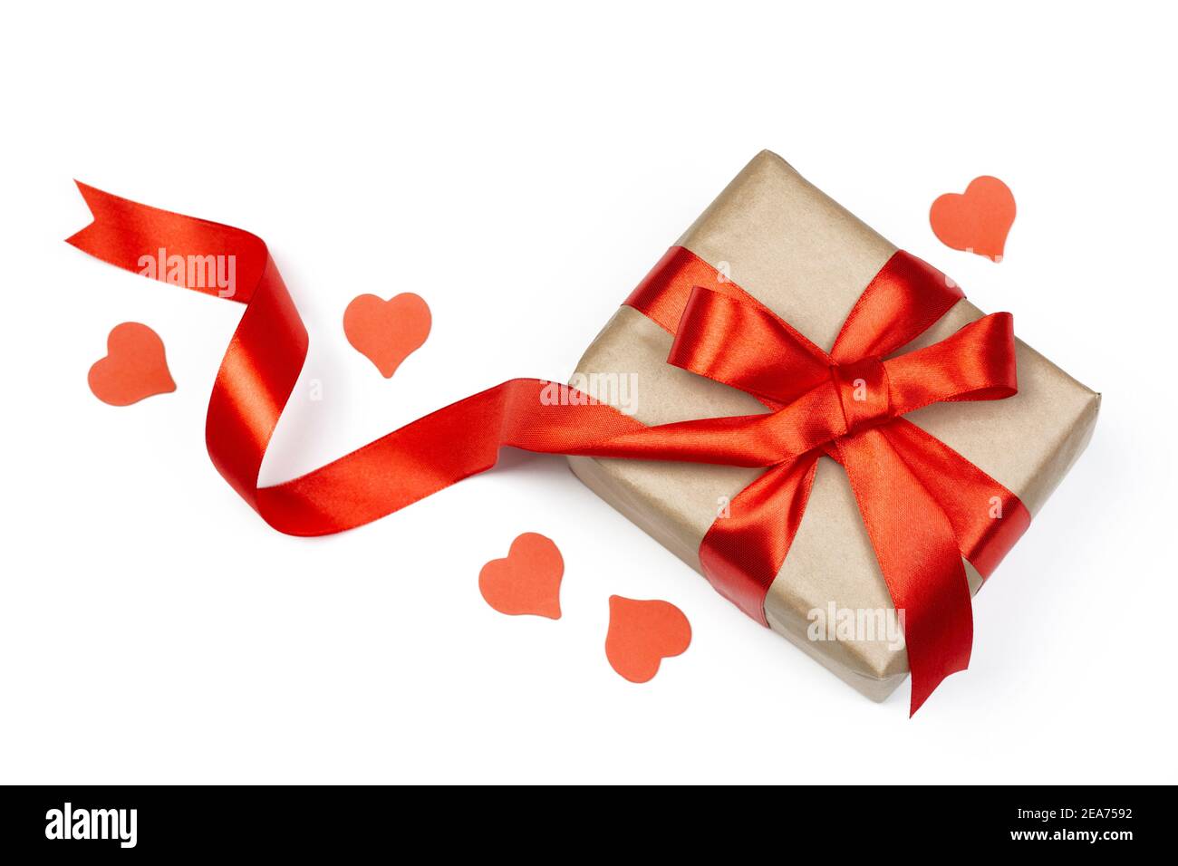 Gift box with red ribbon and little red heart on white background ...