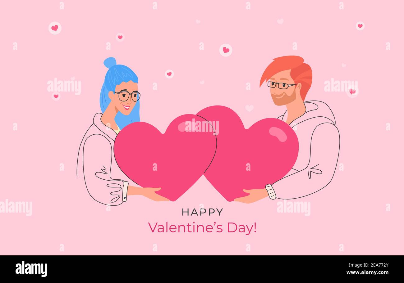 Happy smiling couple holding heart symbols as Valentines card Stock ...