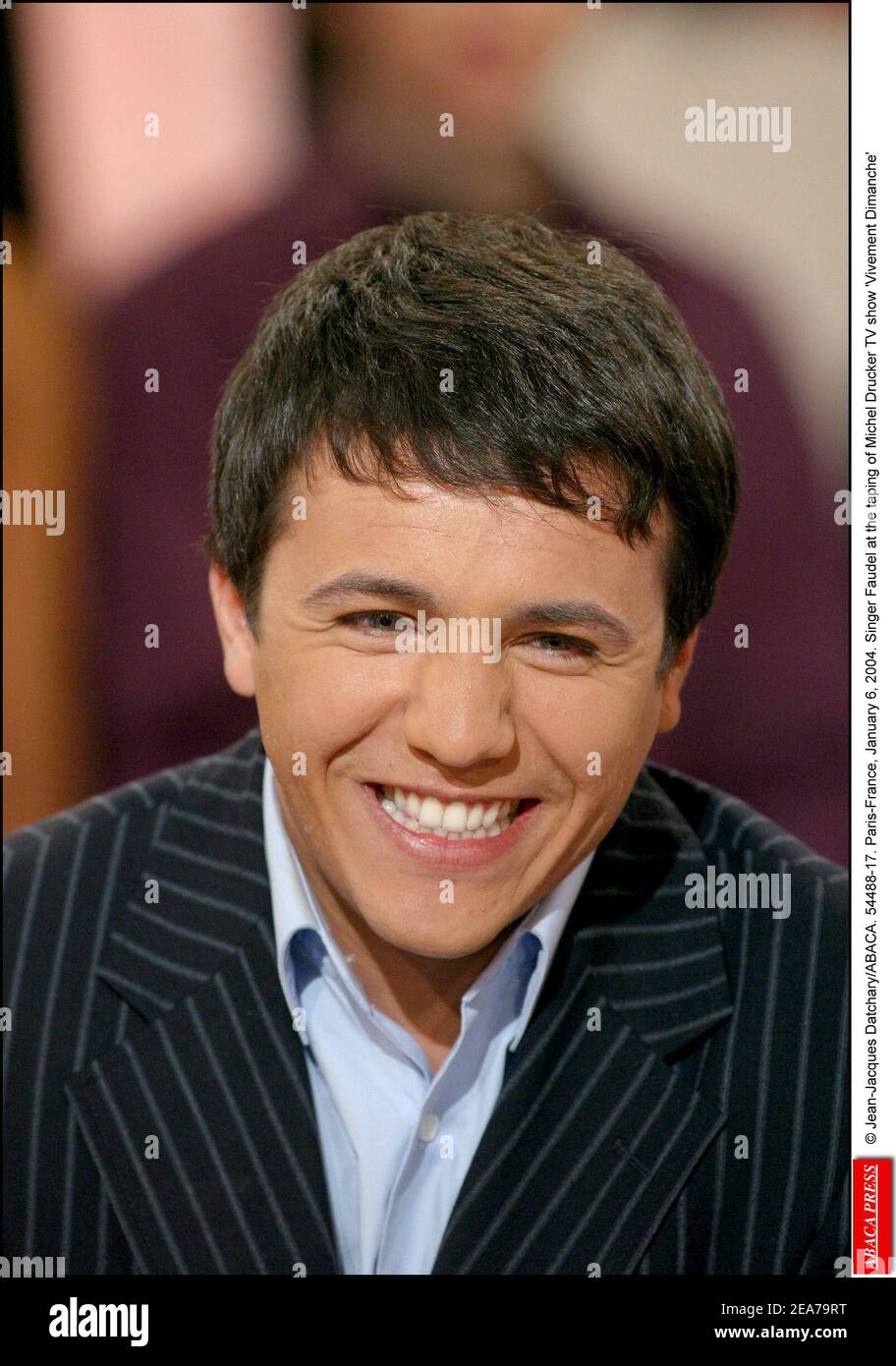 © Jean-Jacques Datchary/ABACA. 54488-17. Paris-France, January 6, 2004. Singer Faudel at the taping of Michel Drucker TV show 'Vivement Dimanche' Stock Photo
