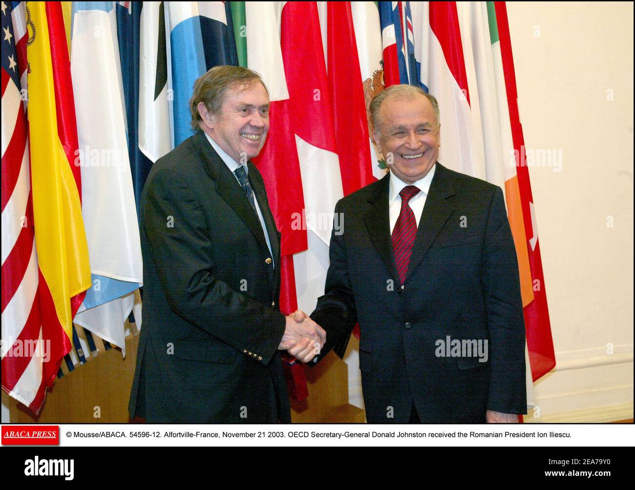 © Mousse/ABACA. 54596-12. Alfortville-France, November 21 2003. OECD Secretary-General Donald Johnston received the Romanian President Ion Iliescu. Stock Photo