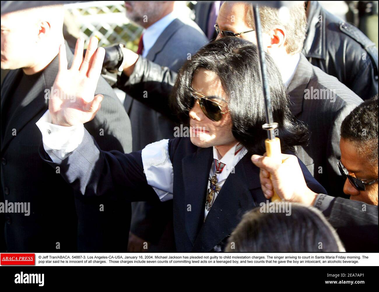 © Jeff Tran/ABACA. 54887-3. Los Angeles-CA-USA, January 16, 2004. Michael Jackson has pleaded not guilty to child molestation charges. The singer arriving to court in Santa Maria Friday morning. The pop star said he is innocent of all charges. Those charges include seven counts of committing lewd acts on a teenaged boy, and two counts that he gave the boy an intoxicant, an alcoholic beverage. Stock Photo