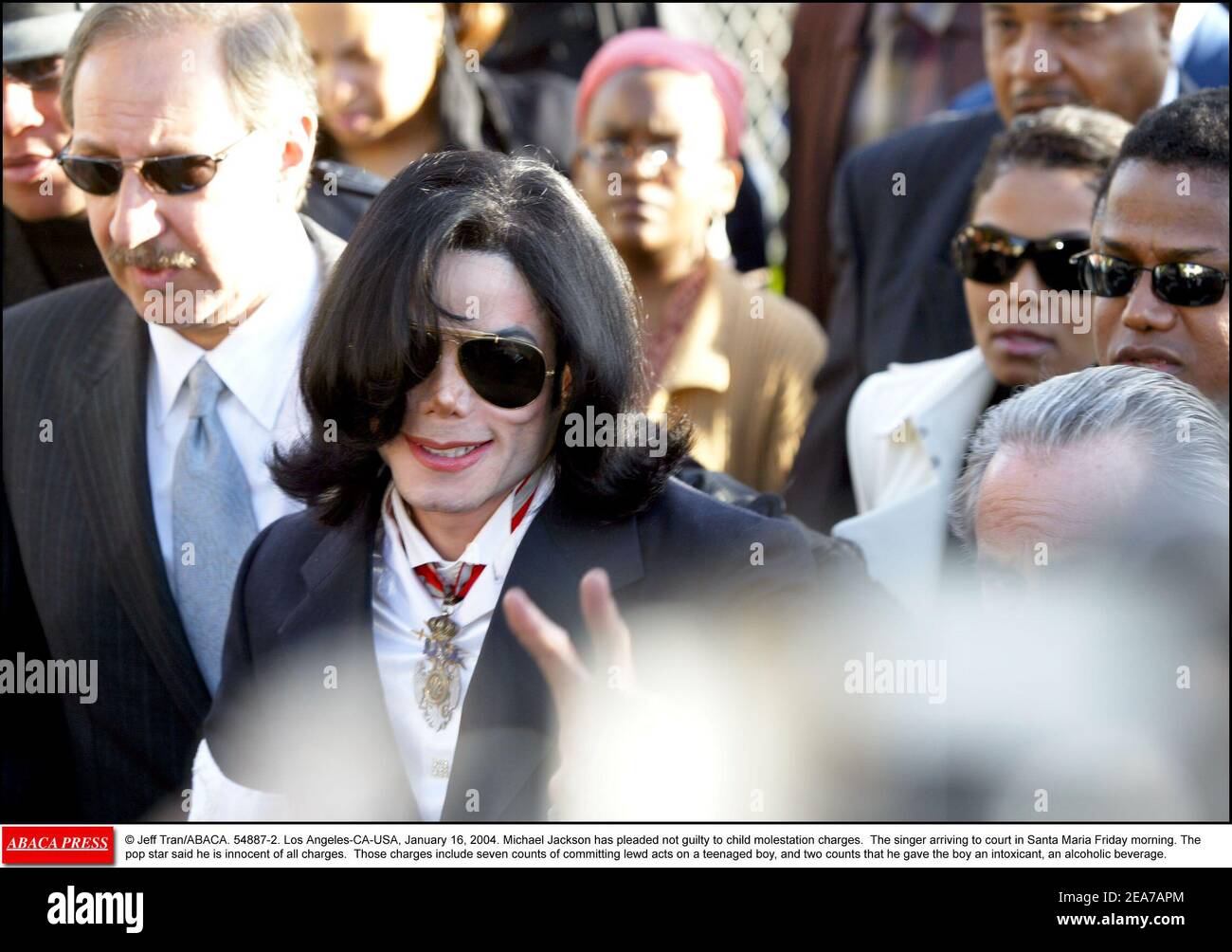 © Jeff Tran/ABACA. 54887-2. Los Angeles-CA-USA, January 16, 2004. Michael Jackson has pleaded not guilty to child molestation charges. The singer arriving to court in Santa Maria Friday morning. The pop star said he is innocent of all charges. Those charges include seven counts of committing lewd acts on a teenaged boy, and two counts that he gave the boy an intoxicant, an alcoholic beverage. Stock Photo