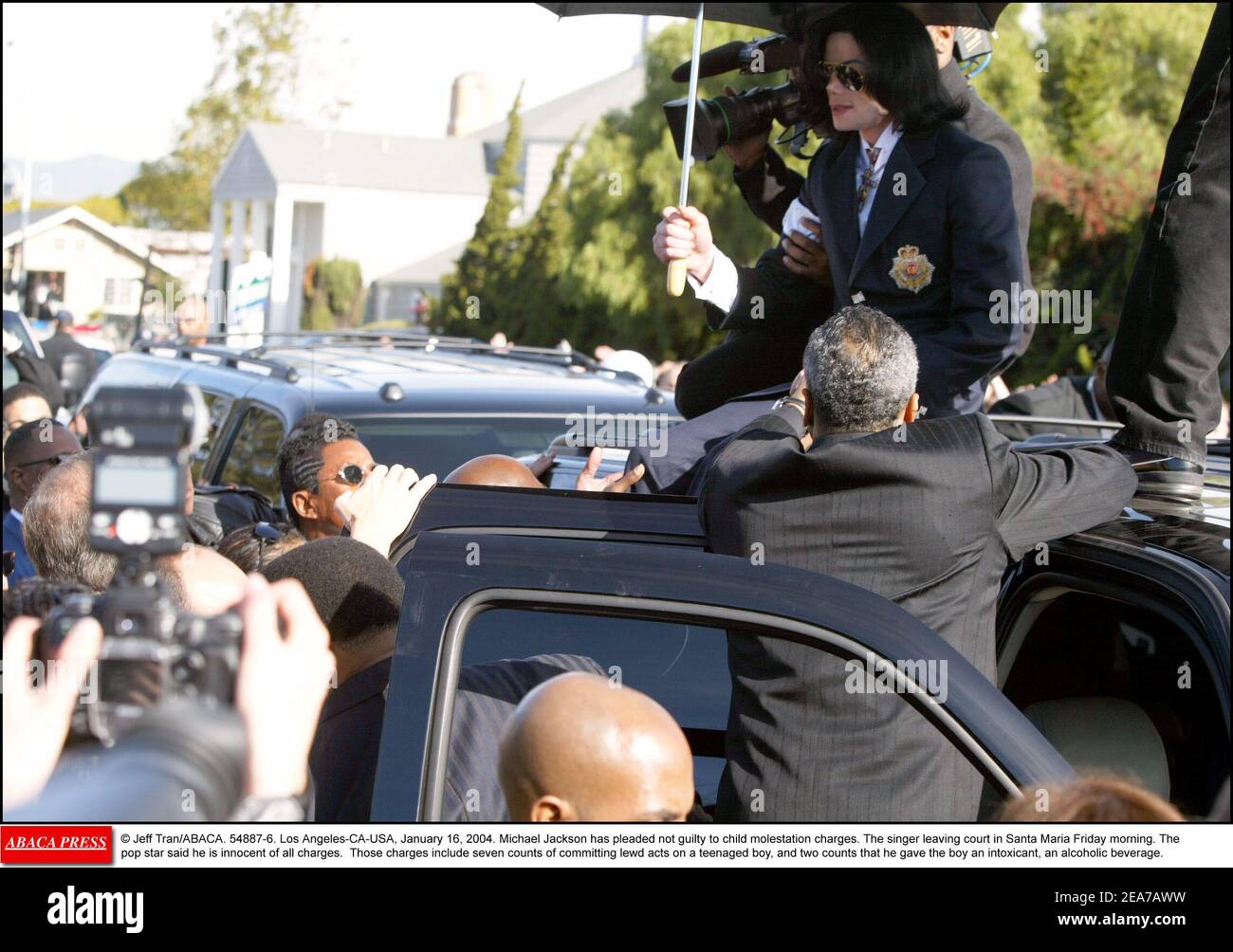 © Jeff Tran/ABACA. 54887-6. Los Angeles-CA-USA, January 16, 2004. Michael Jackson has pleaded not guilty to child molestation charges. The singer leaving court in Santa Maria Friday morning. The pop star said he is innocent of all charges. Those charges include seven counts of committing lewd acts on a teenaged boy, and two counts that he gave the boy an intoxicant, an alcoholic beverage. Stock Photo