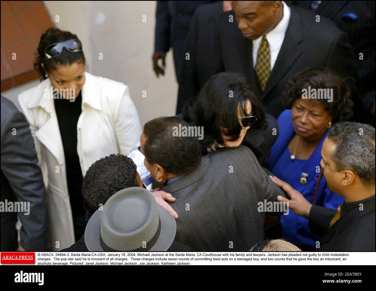 © ABACA. 54894-3. Santa Maria-CA-USA, January 16, 2004. Michael Jackson at the Santa Maria, CA Courthouse with his family and lawyers. Jackson has pleaded not guilty to child molestation charges. The pop star said he is innocent of all charges. Those charges include seven counts of committing lewd acts on a teenaged boy, and two counts that he gave the boy an intoxicant, an alcoholic beverage. Pictured: Janet Jackson, Michael Jackson, Joe Jackson, Kathleen Jackson. Stock Photo