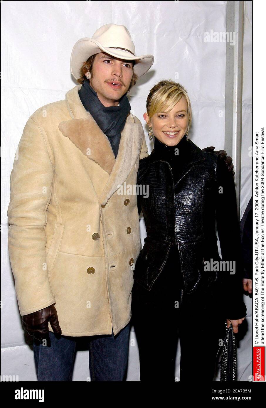 © Lionel Hahn/ABACA. 54917-6. Park City-UT-USA, January 17, 2004. Ashton Kutcher and Amy Smart attend the screening of The Butterfly Effect at the Eccles Theatre during the 2004 Sundance Film Festival. Stock Photo