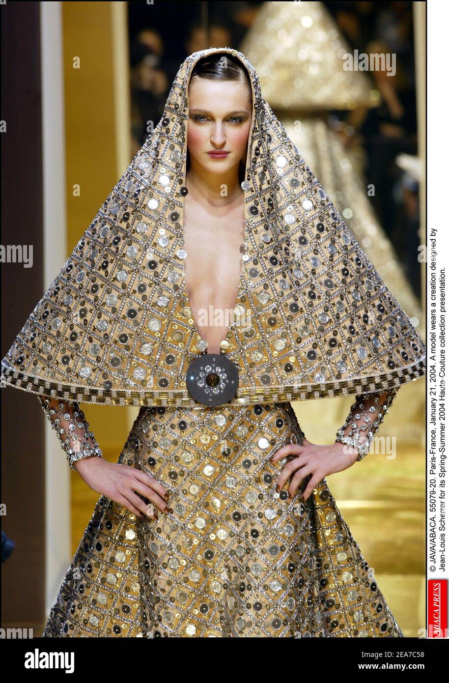JAVA/ABACA. 55079-19. Paris-France, January 21, 2004. A model wears a  creation designed by Jean-Louis Scherrer for its Spring-Summer 2004 Haute- Couture collection presentation Stock Photo - Alamy