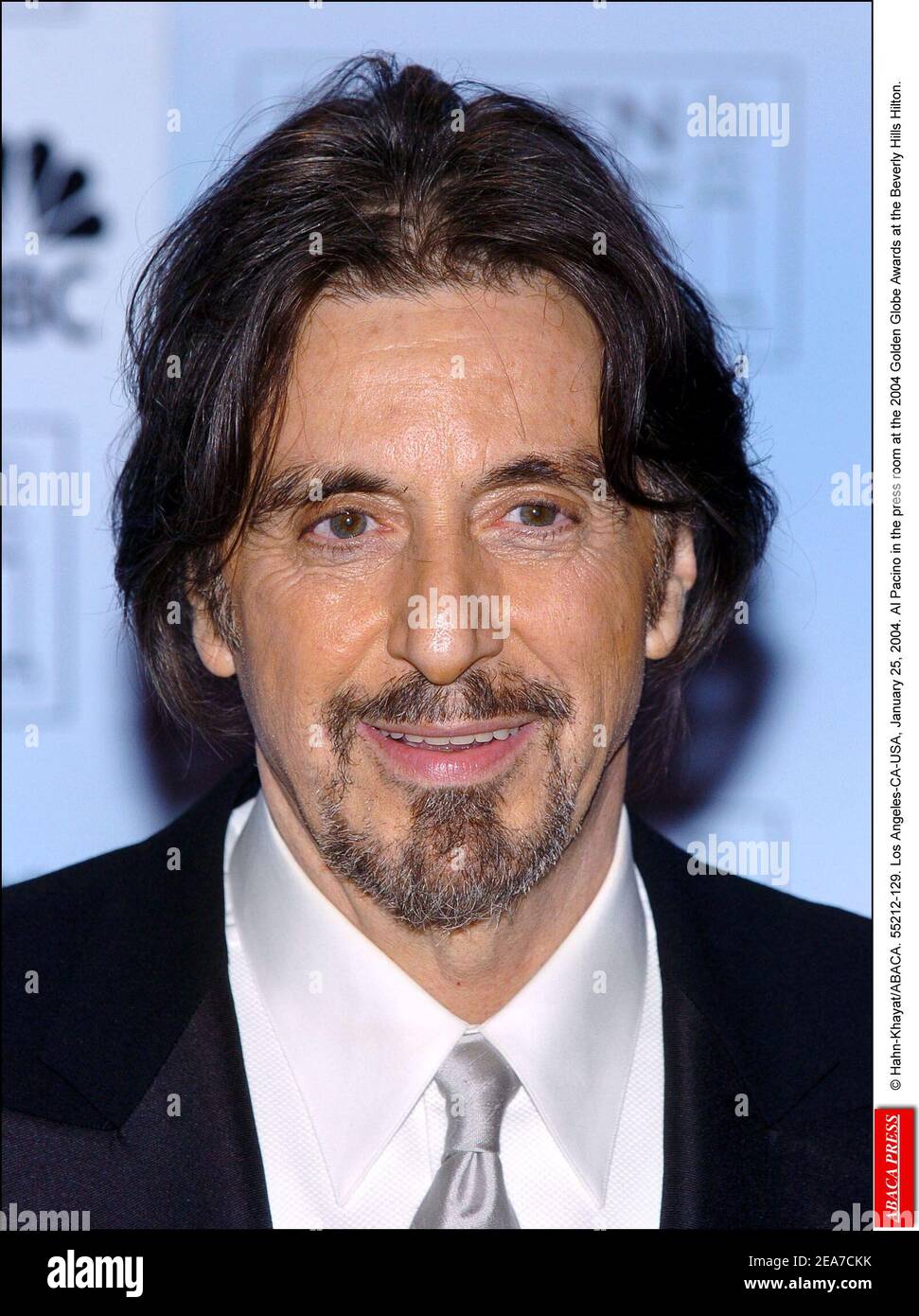 Al Pacino poses with his award in the press room at the 2004 Golden