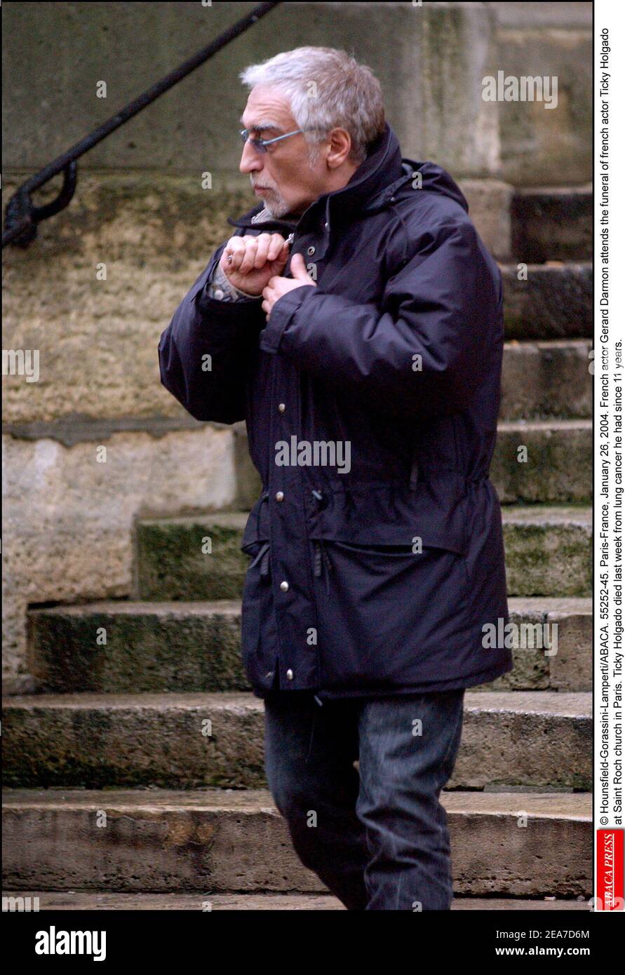 © Hounsfield-Gorassini-Lamperti/ABACA. 55252-45. Paris-France, January 26, 2004. French actor Gerard Darmon attends the funeral of french actor Ticky Holgado at Saint Roch church in Paris. Ticky Holgado died last week from lung cancer he had since 11 years. Stock Photo