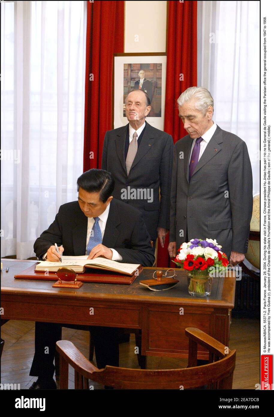 © Mousse/ABACA. 55371-2. Paris-France. January 28, 2004. During his state visit in France, Chinese president Hu Jintao has paid tribute to General de Gaulle visiting the Parisian office the general occupied from 1947 to 1958. He was accompanied by Yves Guna (r), prsident of the Charles de Gaulle's foundation and the Amiral Philippe de Gaulle, son of General de Gaulle (center). Stock Photo