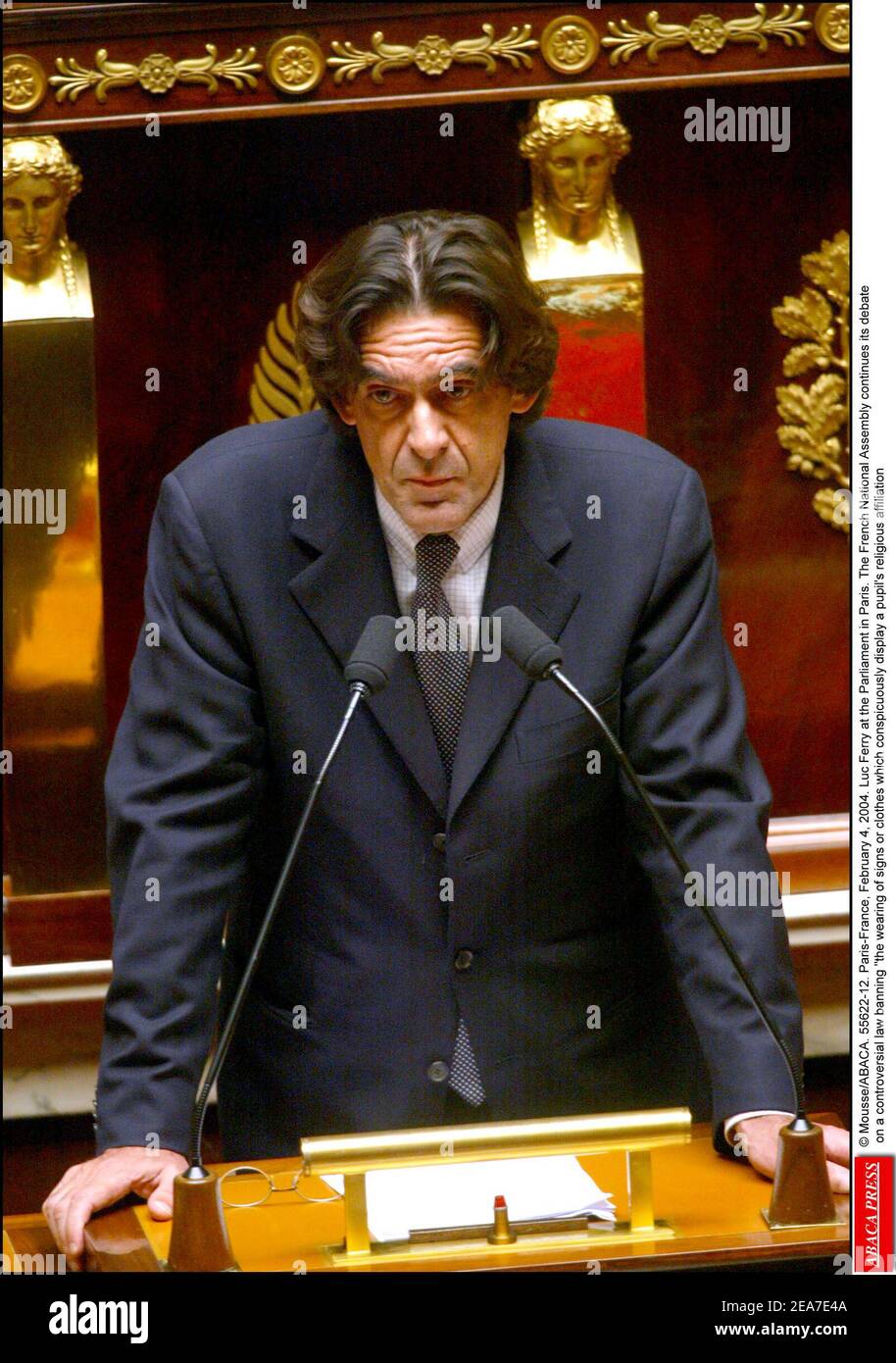 © Mousse/ABACA. 55622-12. Paris-France, February 4, 2004. Luc Ferry at the Parliament in Paris. The French National Assembly continues its debate on a controversial law banning the wearing of signs or clothes which conspicuously display a pupil's religious affiliation Stock Photo