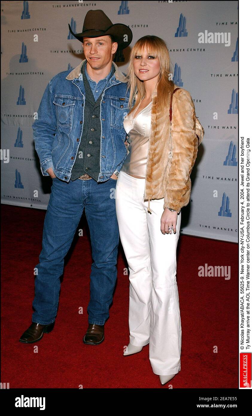 © Nicolas Khayat/ABACA. 55625-9. New York city-NY-USA, February 4, 2004. Jewel and her boyfriend Ty Murray arrive at the AOL Time Warner center on Columbus Circle to attend its Grand Opening Gala Stock Photo