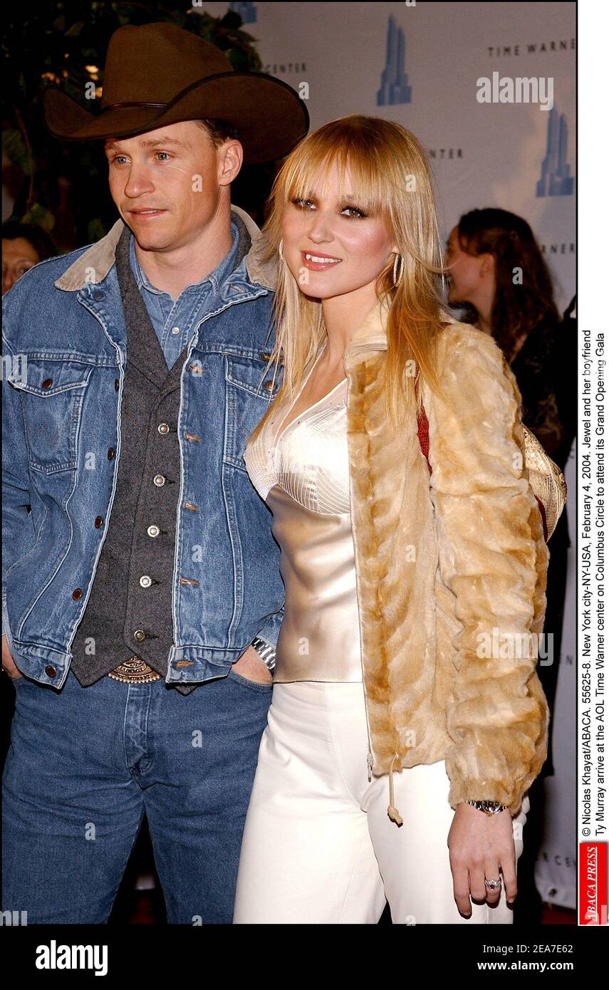 © Nicolas Khayat/ABACA. 55625-8. New York city-NY-USA, February 4, 2004. Jewel and her boyfriend Ty Murray arrive at the AOL Time Warner center on Columbus Circle to attend its Grand Opening Gala Stock Photo