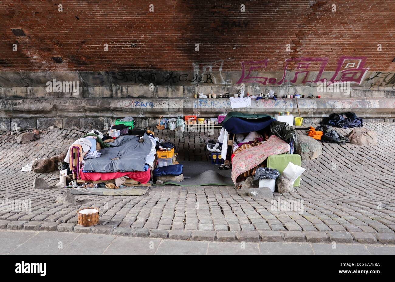 Hamburg, Germany. 08th Feb, 2021. Homeless people have set up their sleeping place under a bridge on Helgoländer Allee. Despite the cold, homeless people in Hamburg still spend the night outdoors. Credit: Christian Charisius/dpa/Alamy Live News Stock Photo
