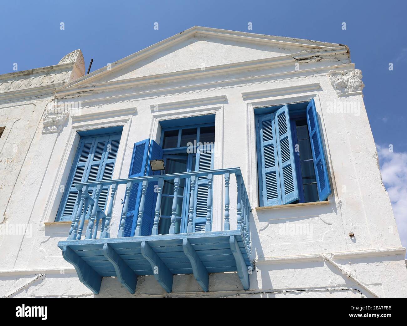 Old Greek House with Blue Window shutters,Balcony and door in ...