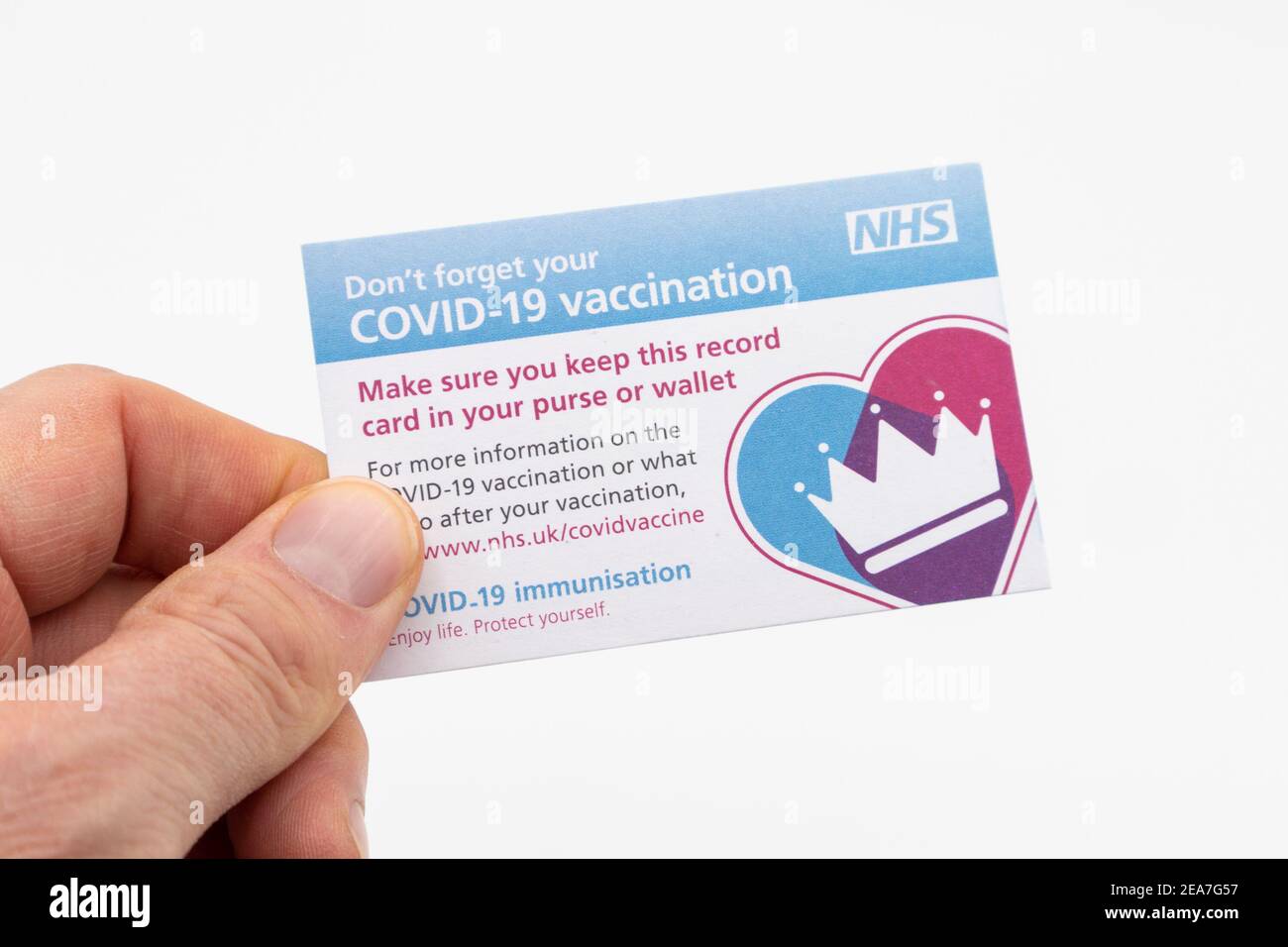 Ashford, Kent, UK. 8th Feb, 2021. A man in receipt of a covid 19 vaccination card with leaflet details for information of recipient. Photo Credit: PAL Media/Alamy Live News Stock Photo
