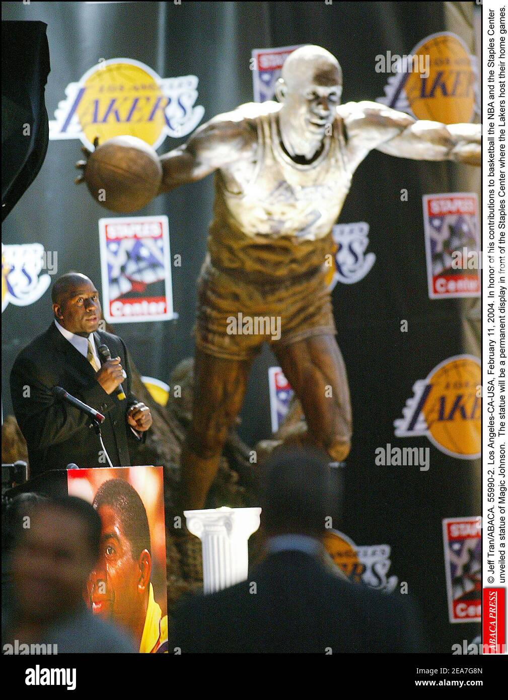 © Jeff Tran/ABACA. 55990-2. Los Angeles-CA-USA, February 11, 2004. In honor of his contributions to basketball the NBA and the Staples Center unveiled a statue of Magic Johnson. The statue will be a permanent display in front of the Staples Center where the Lakers host their home games. Stock Photo