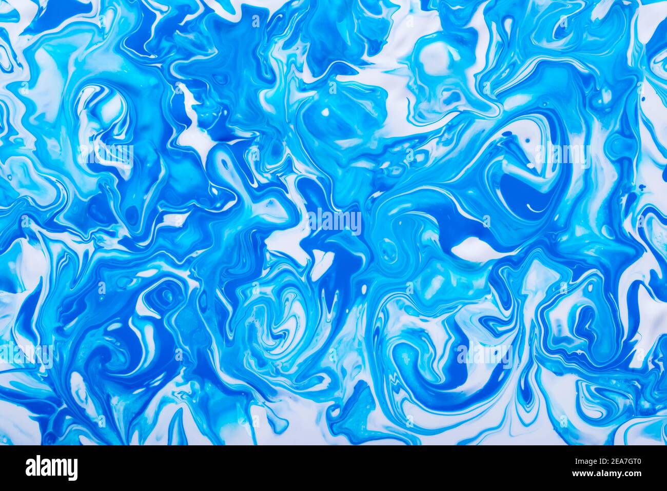 Free flowing blue and white acrylic paint. Random Waves and Curls. Abstract  marble background or texture Stock Photo - Alamy