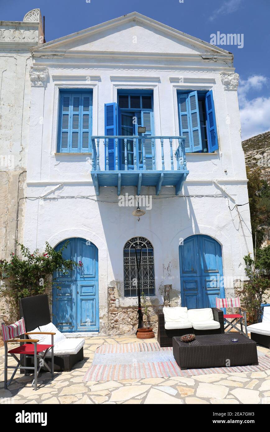 Old Greek House with Blue Window shutters,Balcony and door Stock Photo ...