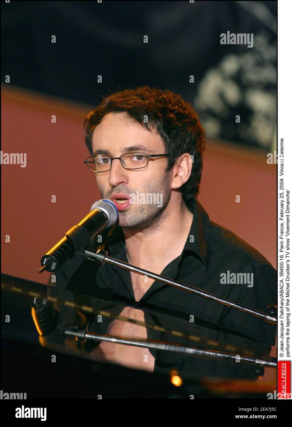 © Jean-Jacques Datchary/ABACA. 56450-16. Paris-France, February 25, 2004. Vincent Delerm performs the taping of the Michel Drucker's TV show 'Vivement Dimanche' Stock Photo