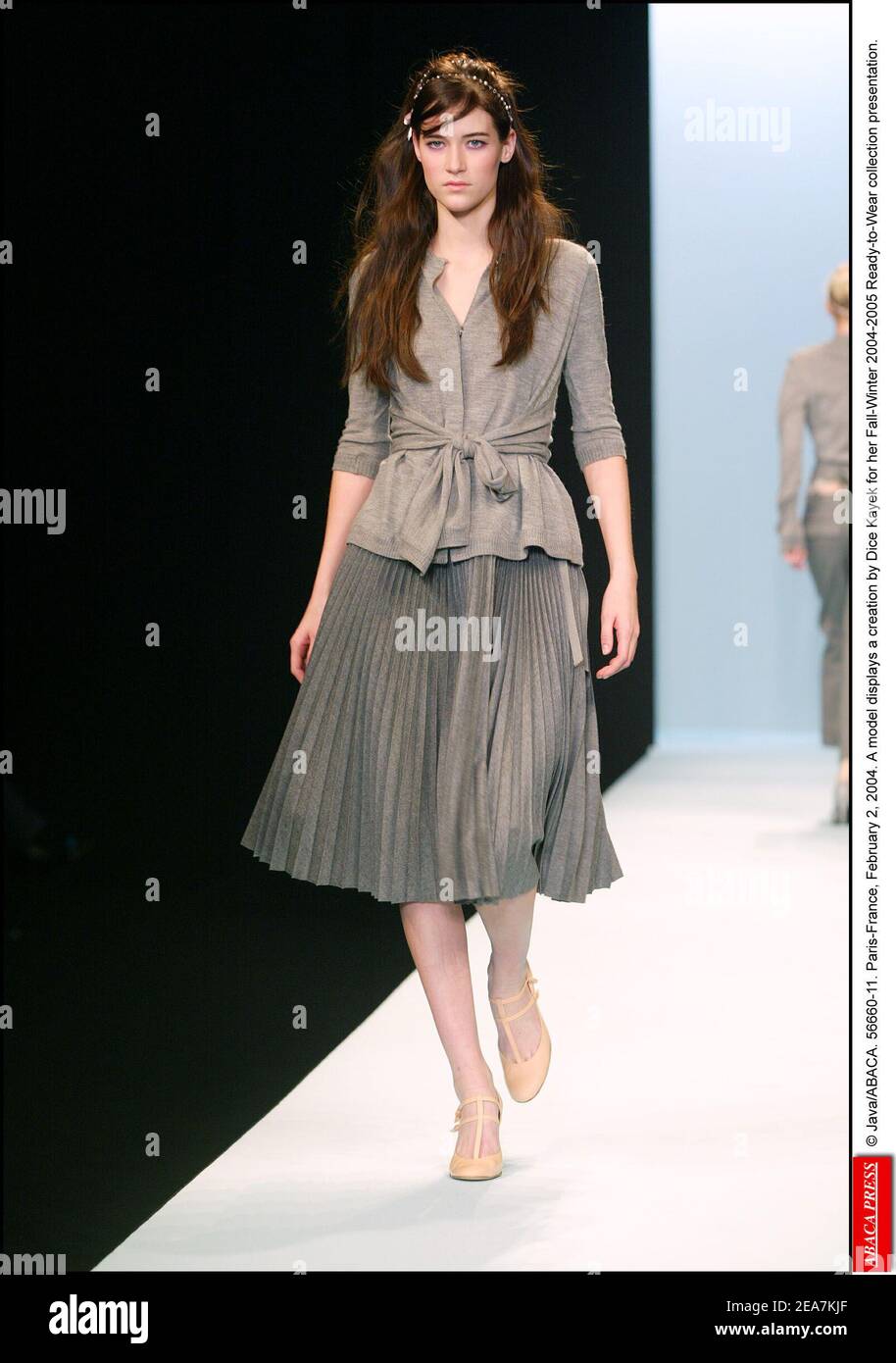 © Java/ABACA. 56660. Paris-France, March 2, 2004. A model displays a creation by Dice Kayek for her Fall-Winter 2004-2005 Ready-to-Wear collection presentation. Stock Photo