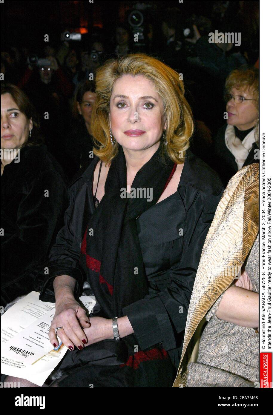 Hounsfield-Klein/ABACA. 56725-8. Paris-France. March 3, 2004. French  actress Catherine Deneuve attends the Jean-Paul Gaultier ready to wear  fashion show Fall/Winter 2004-2005 Stock Photo - Alamy