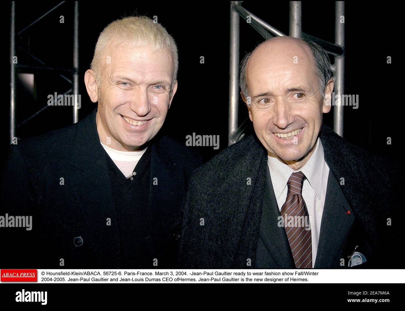 © Hounsfield-Klein/ABACA. 56725-6. Paris-France. March 3, 2004. Jean-Paul Gaultier Ready to wear fashion show Fall/Winter 2004-2005. Jean-Paul Gaultier and Jean-Louis Dumas CEO of Hermes. Jean-Paul Gaultier is the new designer of Hermes. Stock Photo