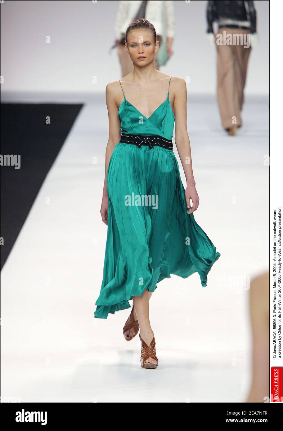 © Java/ABACA. 56896-3. Paris-France, March 6, 2004. A model on the catwalk wears a creation by Chloe for its Fall-Winter 2004-2005 Ready-to-Wear collection presentation. Stock Photo
