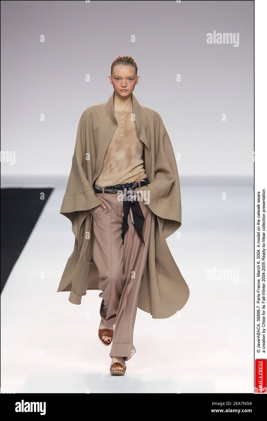 © Java/ABACA. 56896-7. Paris-France, March 6, 2004. A model on the catwalk wears a creation by Chloe for its Fall-Winter 2004-2005 Ready-to-Wear collection presentation. Stock Photo