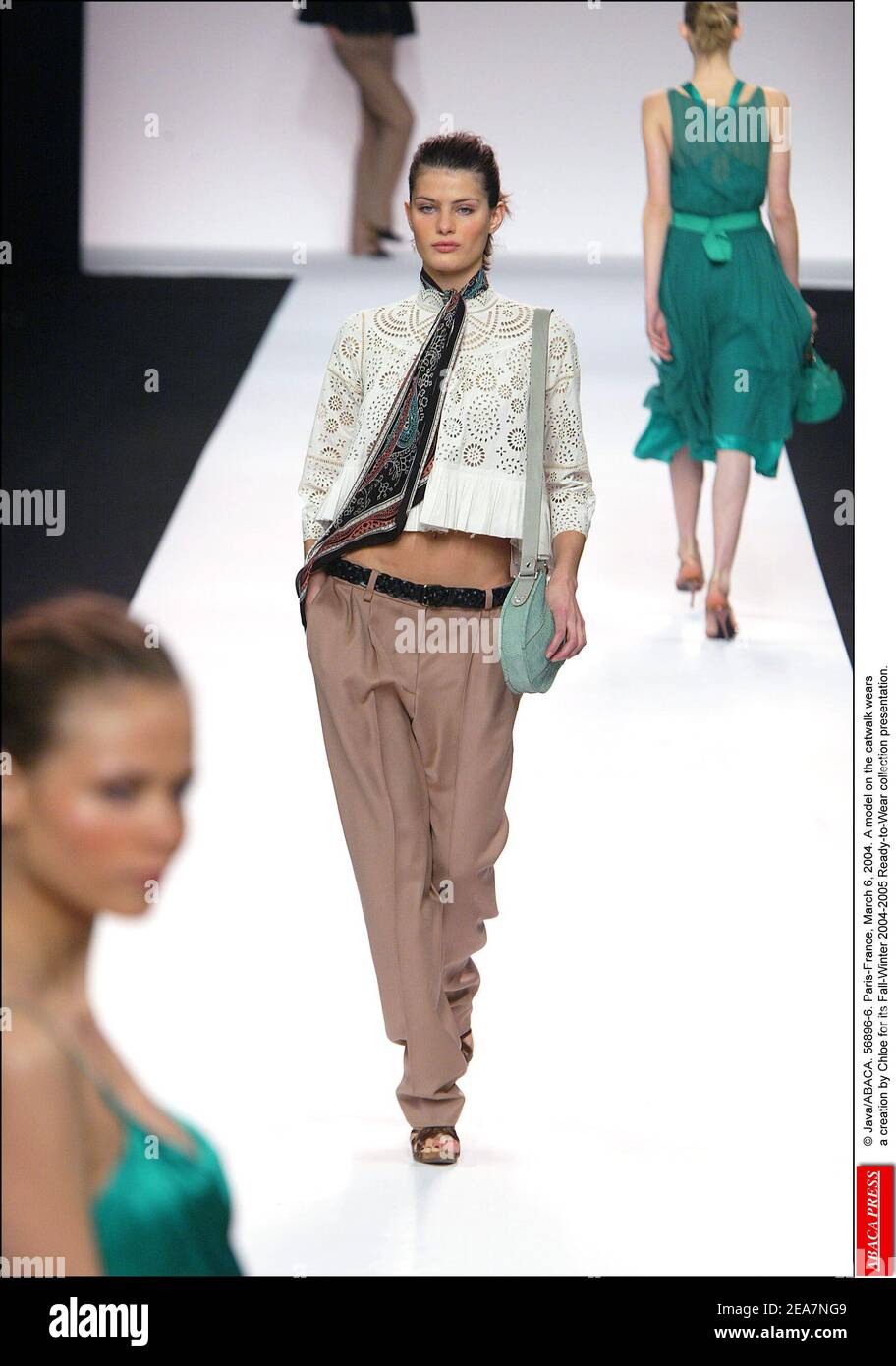 © Java/ABACA. 56896-6. Paris-France, March 6, 2004. A model on the catwalk wears a creation by Chloe for its Fall-Winter 2004-2005 Ready-to-Wear collection presentation. Stock Photo