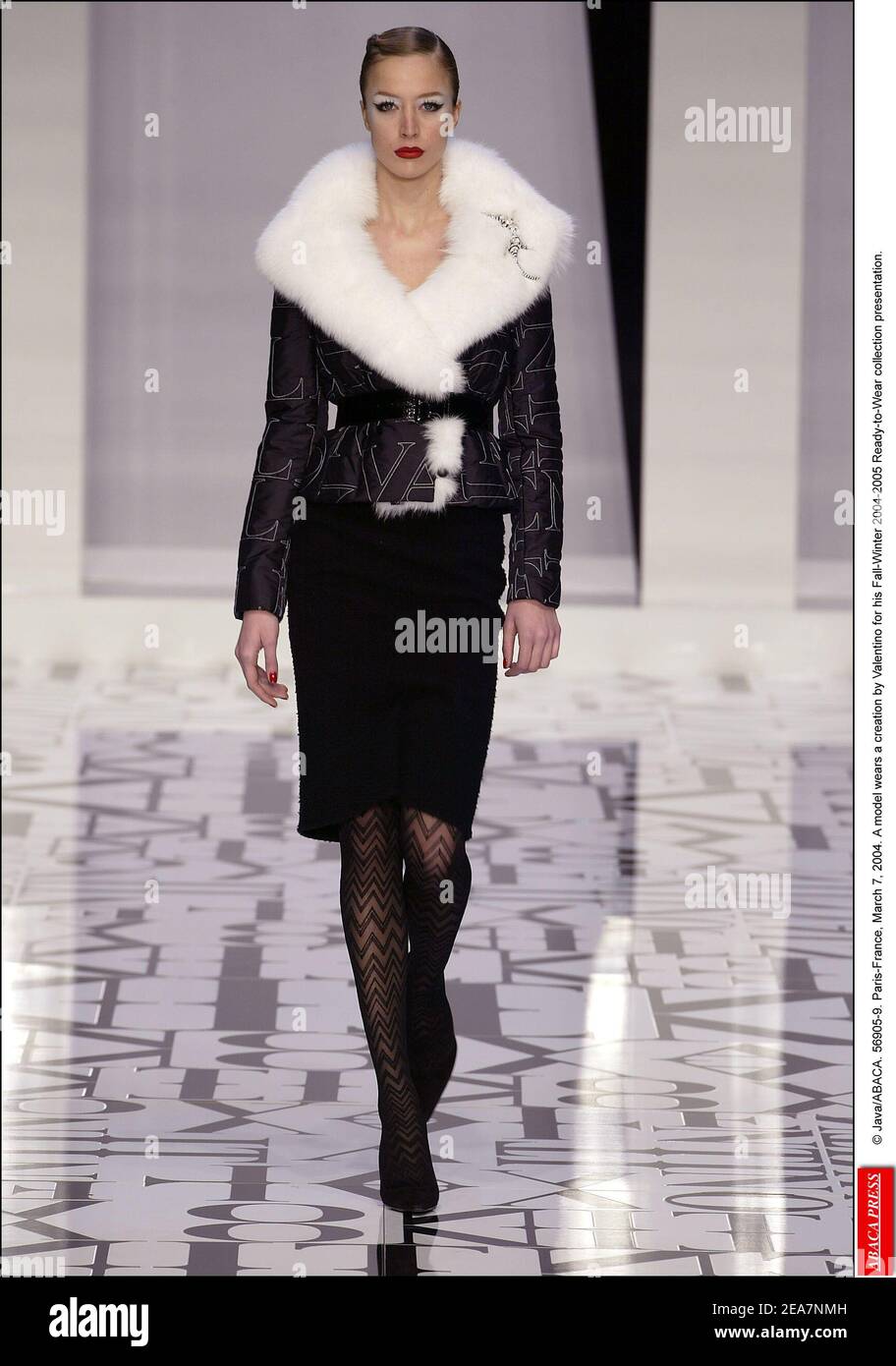 © Java/ABACA. 56905-9. Paris-France, March 7, 2004. A model wears a creation by Valentino for his Fall-Winter 2004-2005 Ready-to-Wear collection presentation. Stock Photo