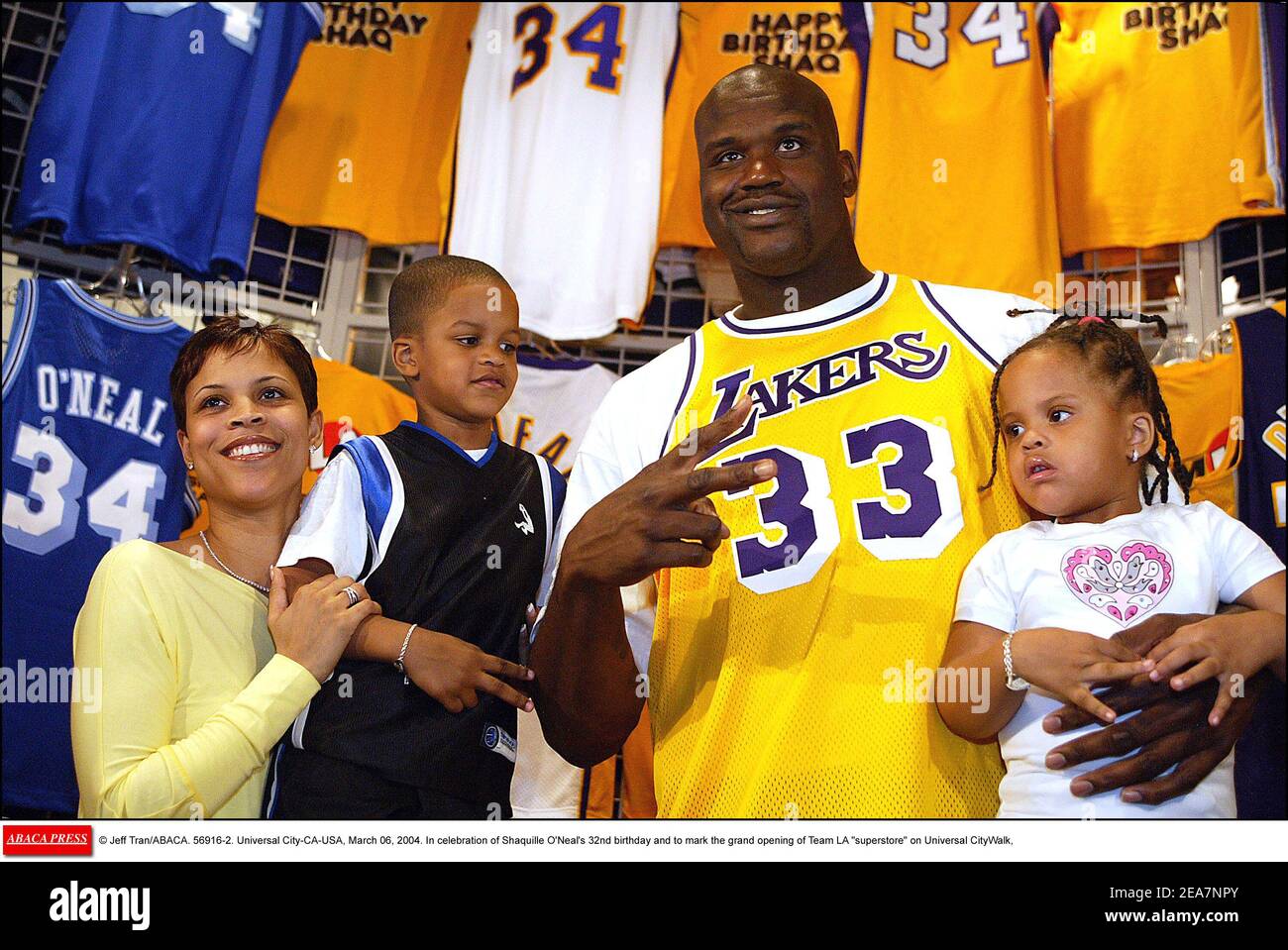 © Jeff Tran/ABACA. 56916-2. Universal City-CA-USA, March 06, 2004. In celebration of Shaquille O'Neal's 32nd birthday and to mark the grand opening of Team LA superstore on Universal CityWalk, Shaquille unveils a 40 feet tall neon sign in his likeness sporting his famous number 34 Lakers Jersey. However, Shaquille attends the event wearing a Lakers Jersey number 33 which was once worn by a retired Lakers player, Kareem Abdul-Jabar. Stock Photo