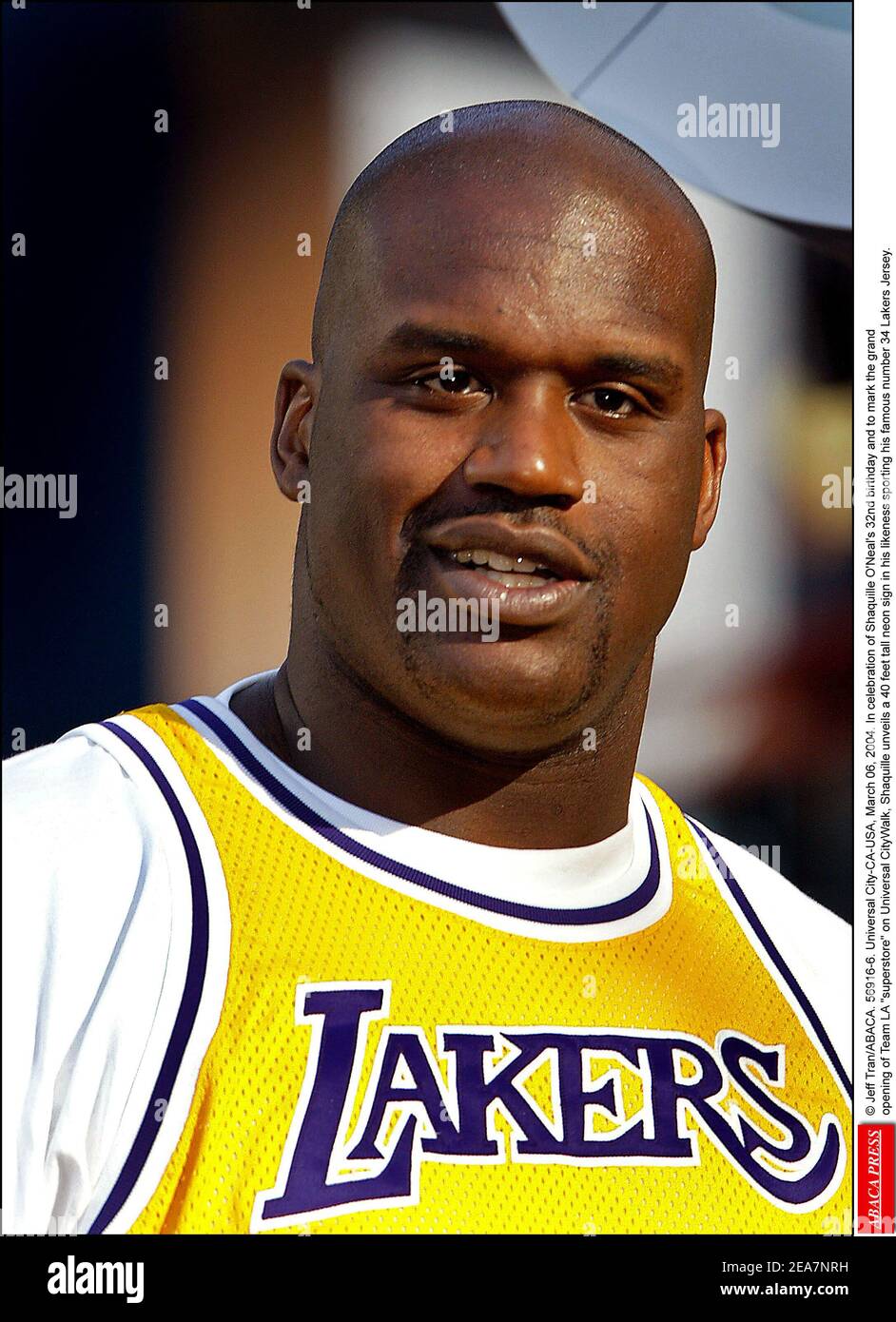 In celebration of Shaquille O'Neal's 32nd birthday and to mark the grand opening of Team LA superstore on Universal CityWalk, Shaquille unveils a 40 feet tall neon sign in his likeness sporting his famous number 34 Lakers jersey. However, Shaquille attends the event wearing a Lakers jersey number 33 which was once worn by a retired Lakers player, Kareem Abdul-Jabar. (Pictured: Shaquille O'neal) UNIVERSAL CITY, CA, SATURDAY, MARCH 06 , 2004. Photo by Jeff Tran/ABACA Stock Photo