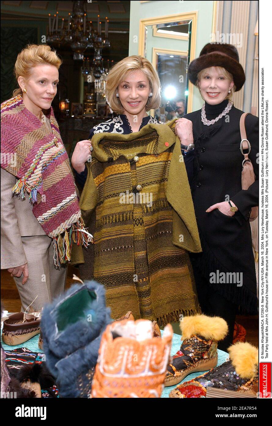 © Nicolas Khayat/ABACA. 57290-9. New York City-NY-USA. March 16, 2004. Mrs Lory Newhouse, hostess Mrs Susan Gutfreund and Mrs Donna Rosen attend the LifeLine charity association Tea Party held at Mrs John H. Gutfreund's house on Fifth avenue in New York, on Tuesday, March 16, 2004. (Pictured : Lory Newhouse, Susan Gutfreund, Donna Rosen). Stock Photo